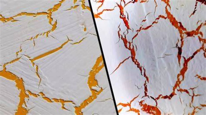 Why does paint crack on canvas?